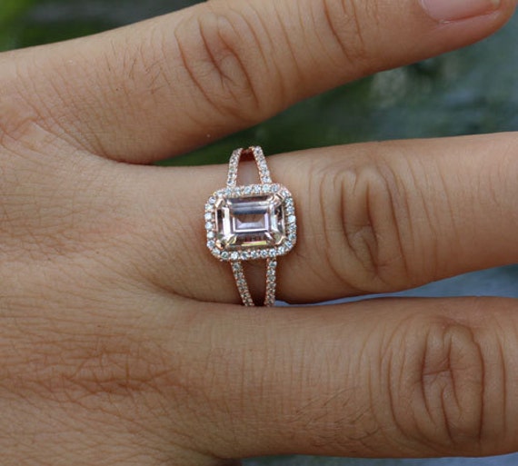 Split shank emerald cut diamond engagement rings