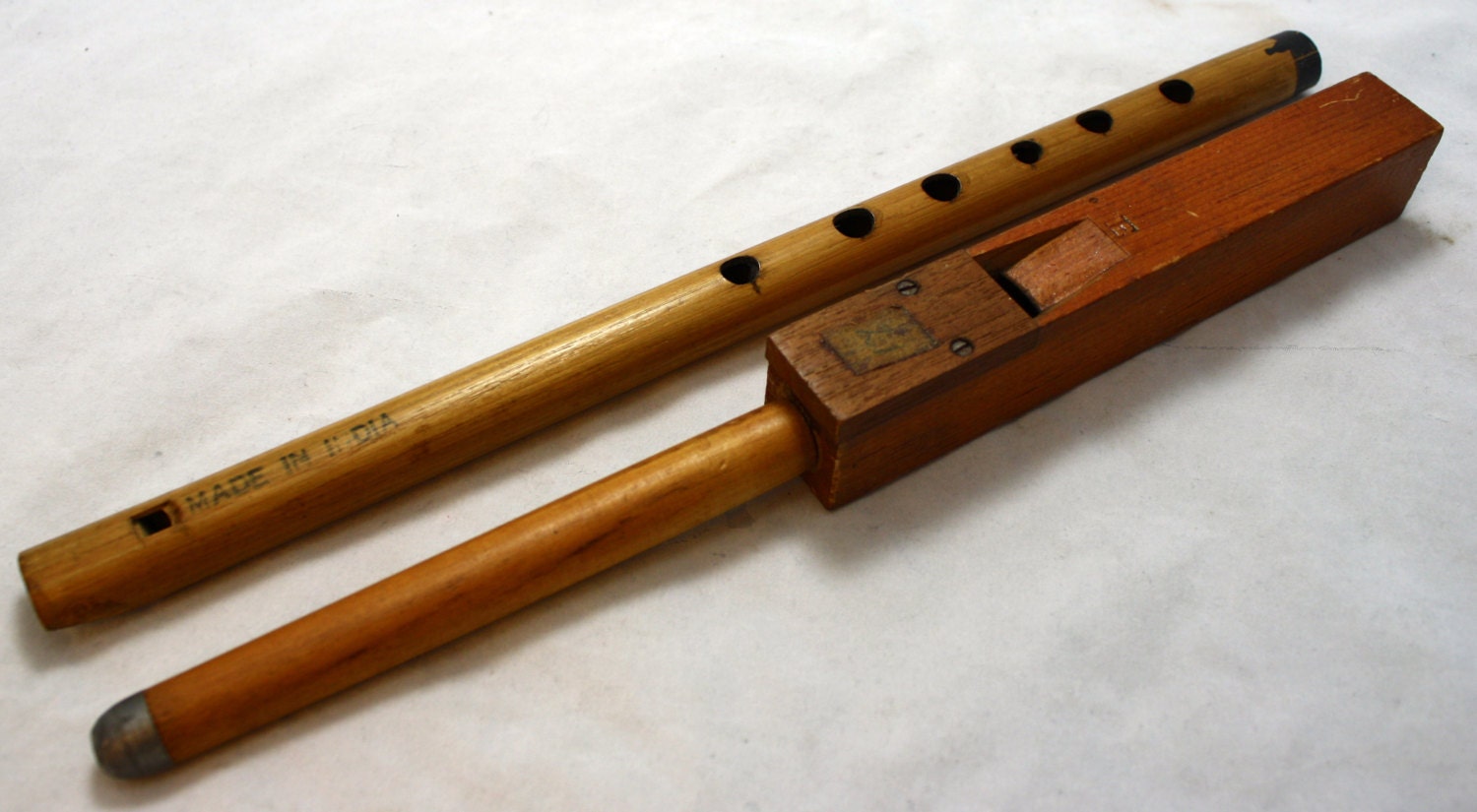vintage wooden flute and wooden tuner e