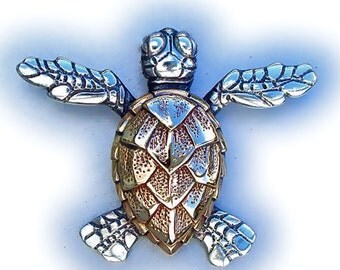 Sea turtle hatchling necklace , gold and silver double sided pendant.