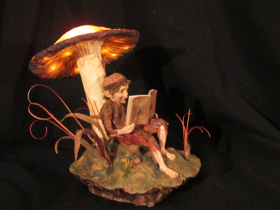 Faerie Reading Under a Mushroom by June Gallagher | September Artist of the Month on Kater's Acres Polymer Clay Blog Faerie Reading Under a Mushroom by June Gallagher | September Artist of the Month on Kater's Acres Polymer Clay Blog