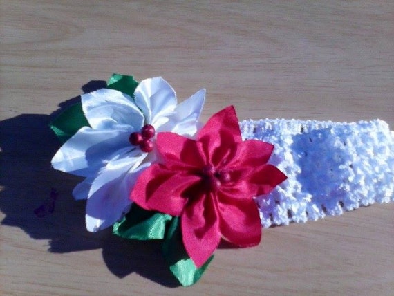 Red and White Pointsettia Headband on a white crochet elastic band