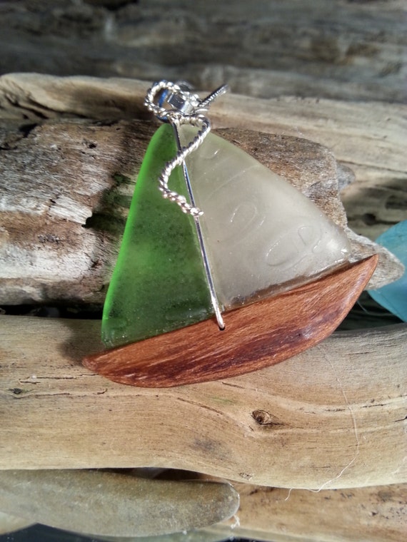 sea glass sailboat pendant with textured green and white sails