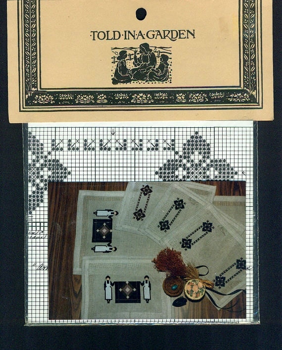 Told in a Garden Counted Cross Stitch by patternpeddlerannex