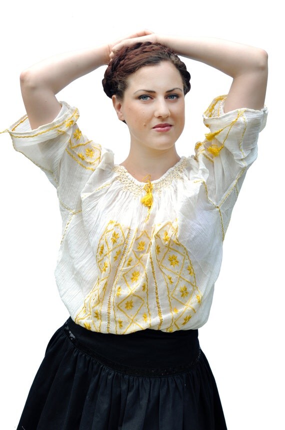 ethnic white blouse with yellow handmade embroidery ethnic white blouse with yellow handmade embroidery