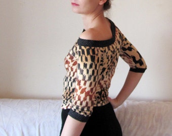 Off shoulder asymmetrical lycra top 3 4 sleeve funky print