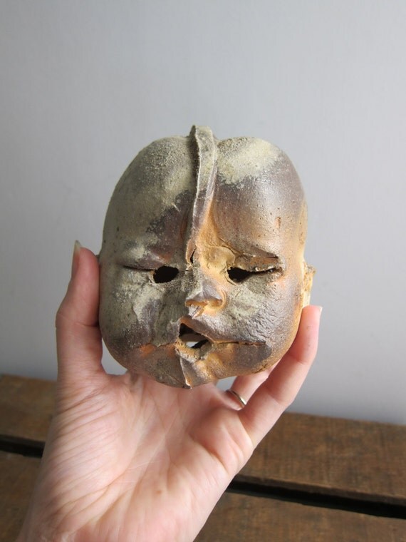 clay doll head