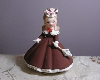 Really sweet vintage napco little girl with hat and parasol all dressed up in Sunday best figurine