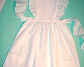 Pinafore Jumper Dress in White broadcloth with eyelet flutter sleeves. Sizes 4 to 6. Made to Order.