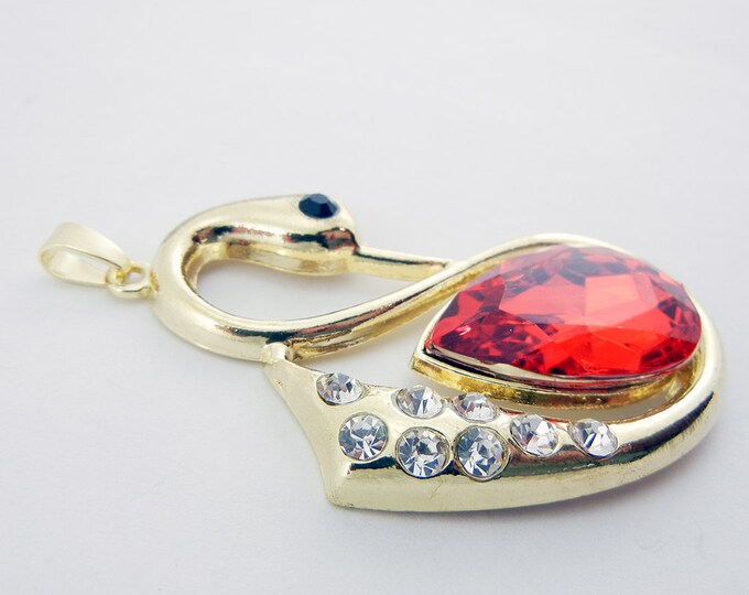 Large Gold-tone Swan Pendant with Rhinestones and Red Acrylic Faceted Gem