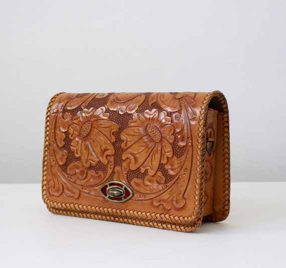 vintage tooled leather clutch