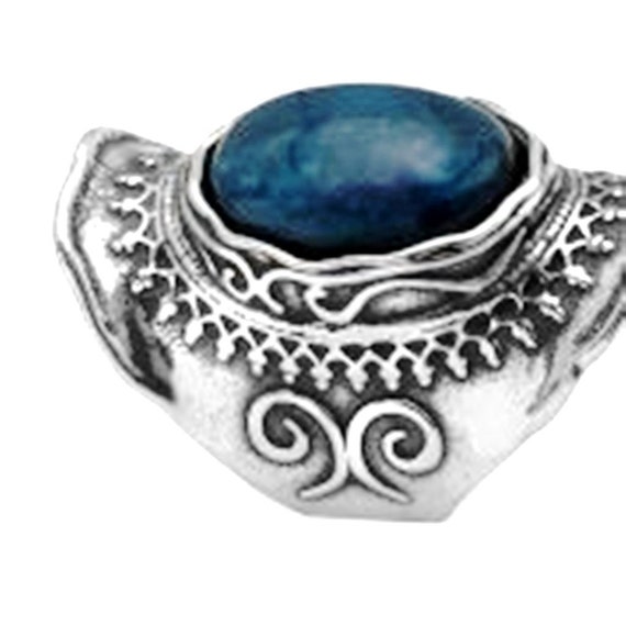 Turquoise on  silver ring
