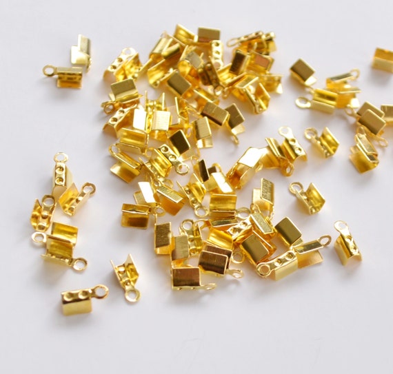 Fold over gold metal micro crimp for jewelry by Stuffnfeathers