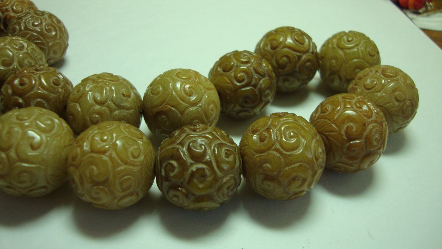 4 Large Carved Jade Beads