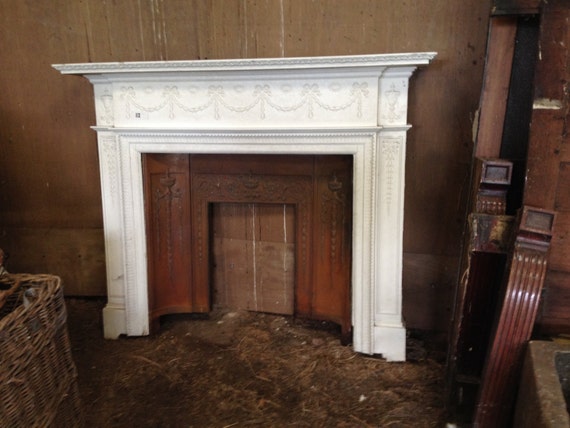 Antique Adams style fireplace and surround.