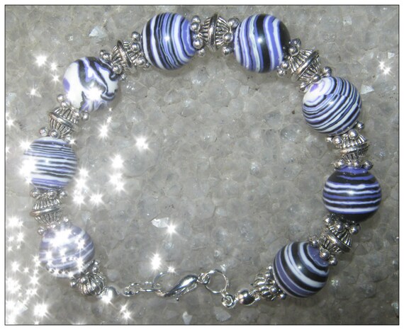 Beautiful Handmade Silver Bracelet with Purple Phoenix Gemstones