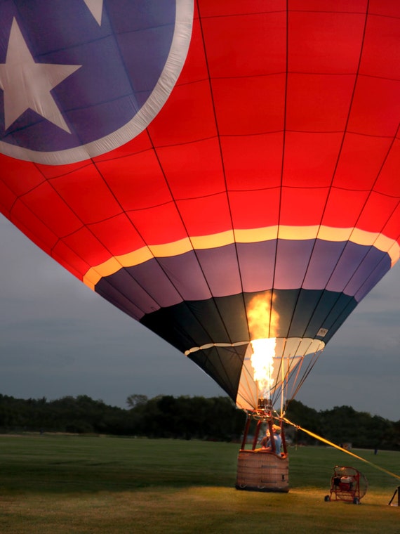 Hot Air Balloon is Filled For Flight on the Ground by imagesbytony