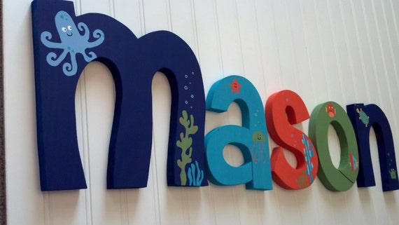 Custom hand painted nursery letters by BurnsWithInspiration