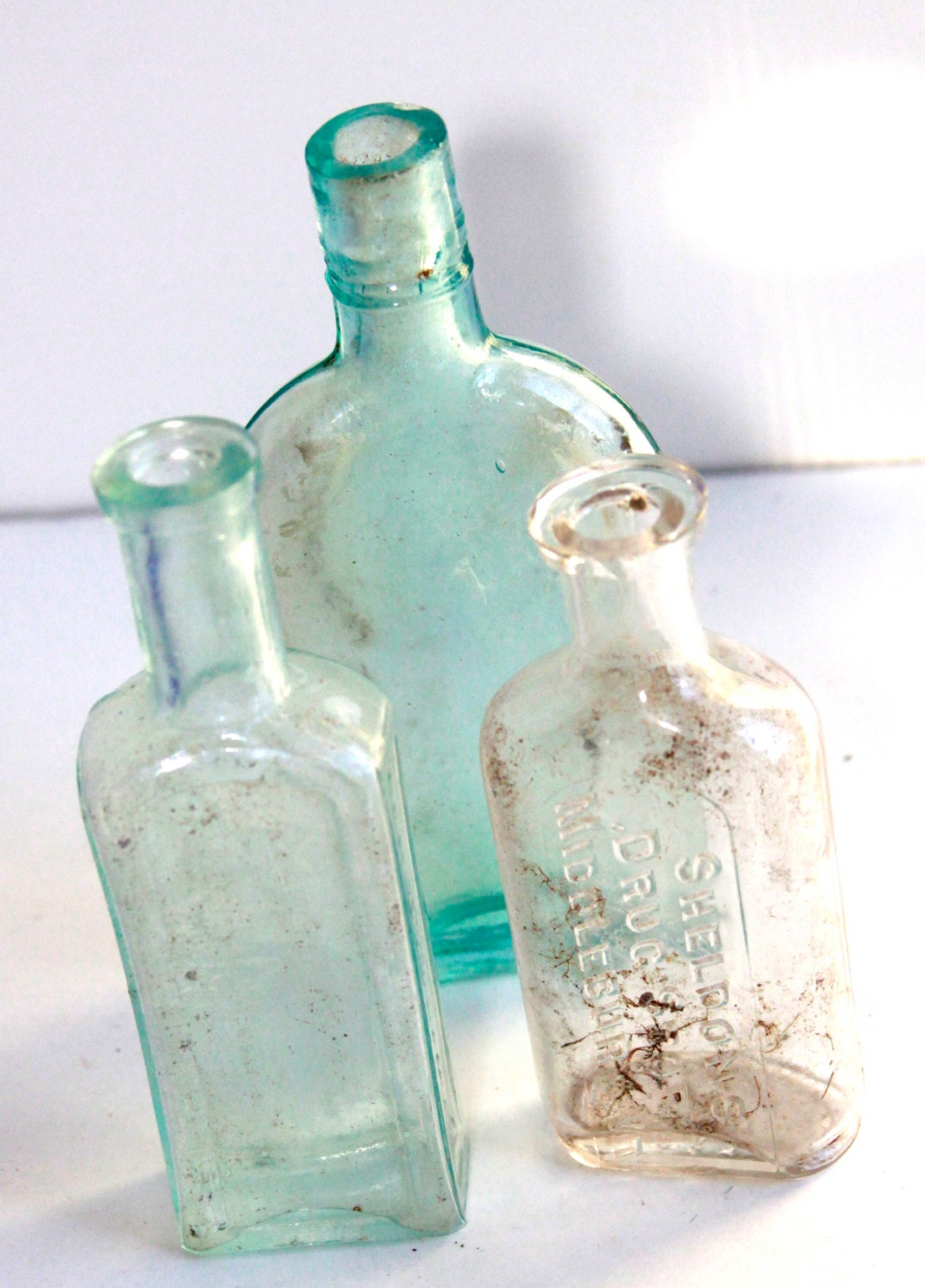 Download Set of 3 vintage glass bottles blue and clear glass by ...