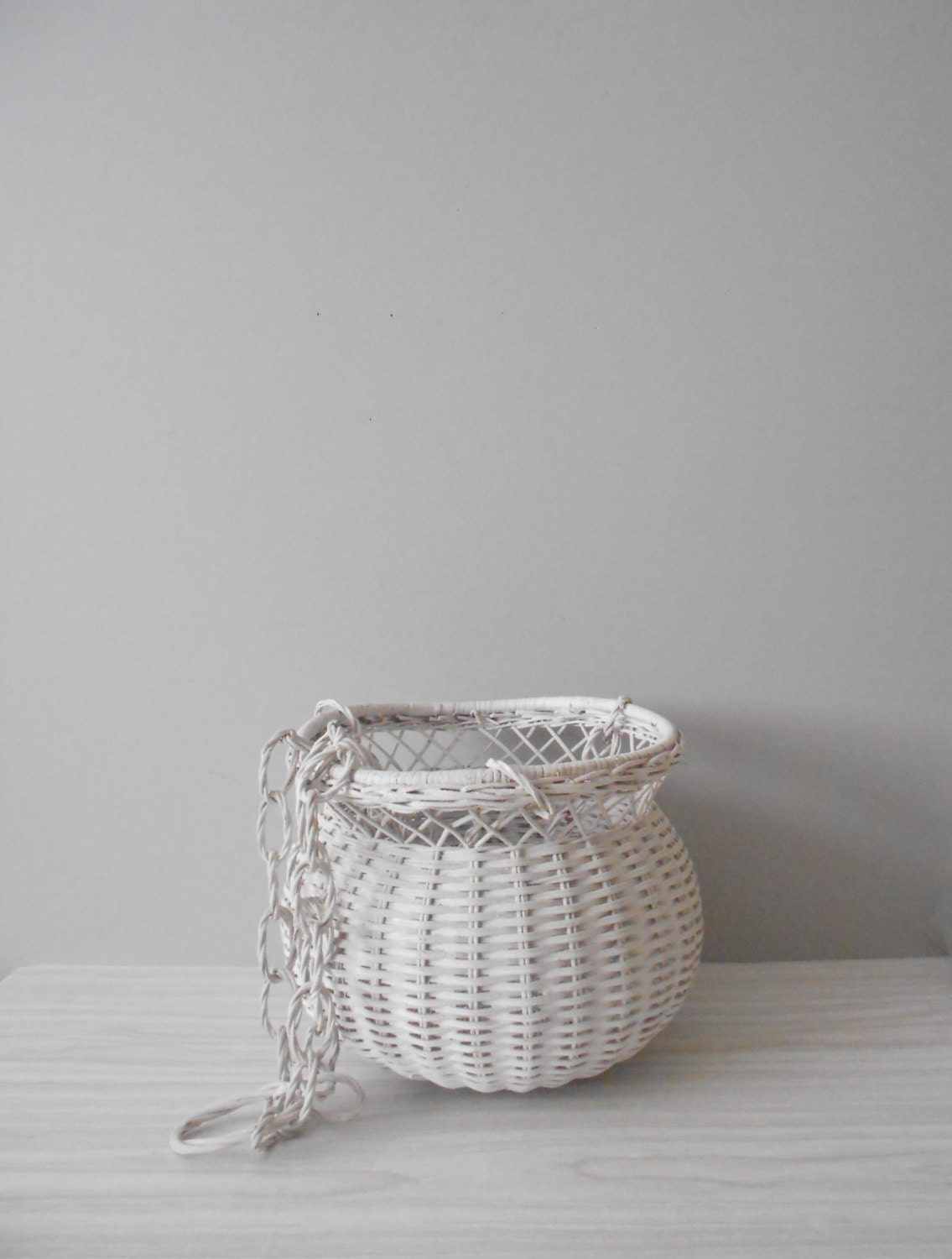 large hanging white wicker basket // flower basket // cottage