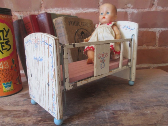 antique doll crib with wheels