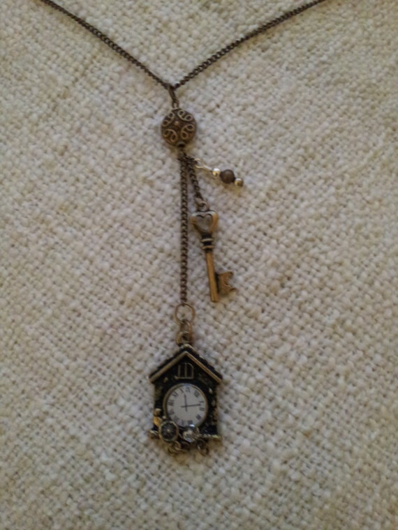Items similar to Antique Clock Necklace on Etsy
