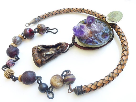 Delight in Solitude. Rustic boho tribal assemblage necklace with amethyst and buddhist talisman.