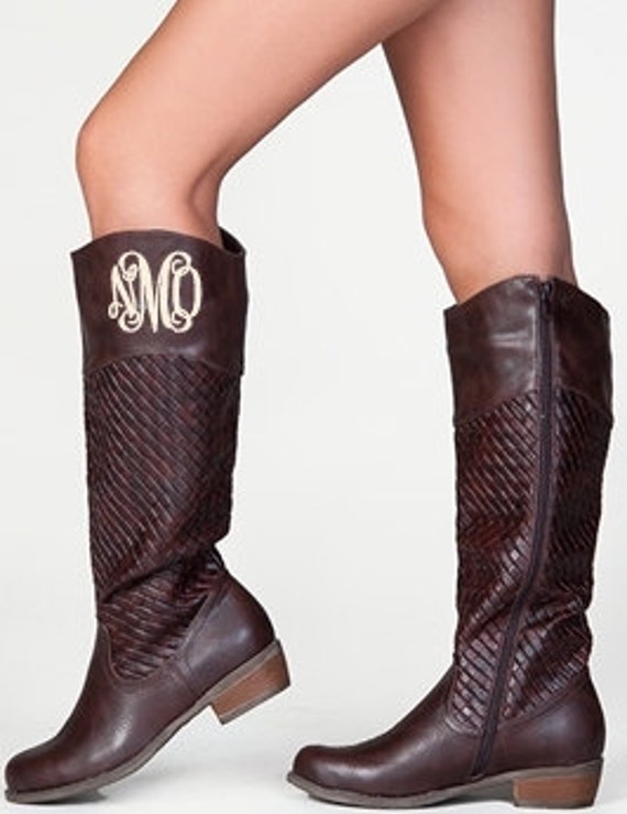 monogram plaque long leather boots