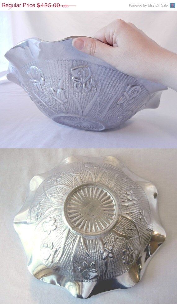 https://www.etsy.com/listing/158788817/on-sale-rare-salesman-sample-metal-bowl