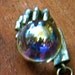50% Off Hand Holding Irridescent Crystal Ball Pendant