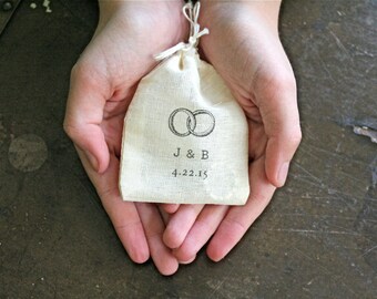 Personalized wedding ring bag. Ring pillow alternative, ring bearer accessory, ring warming ceremony. Ring motif with initials and date.
