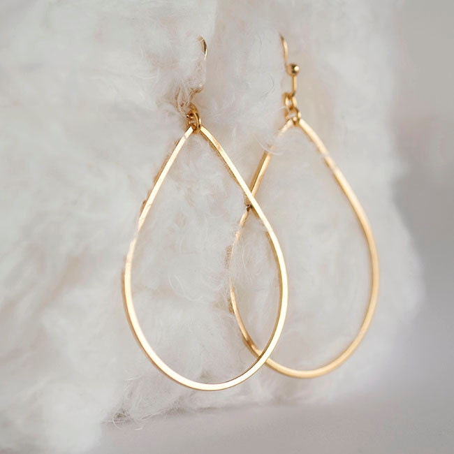 Large gold dangle hoop earrings