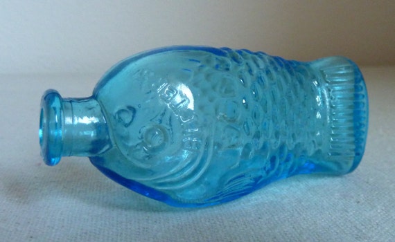 Download Fisch's Bitters miniature blue glass bottle fish shaped Yellowimages Mockups