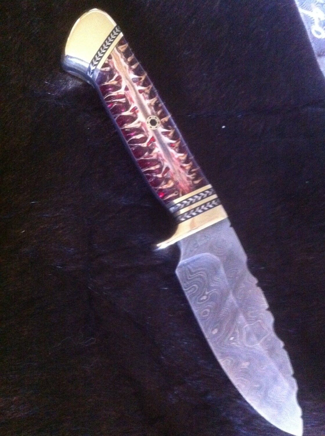 Custom hand made knife.Alabama Damascus steel pine cone
