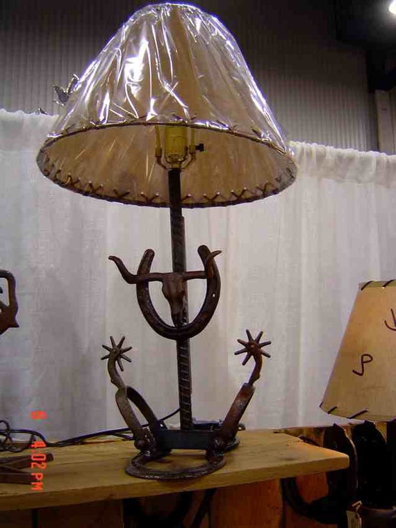 Rustic table lamp with steer head on horseshoe and western