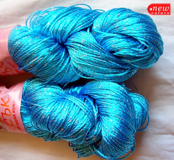 Summer yarn sparkle. Glitter, sleek yarn in light blue color.