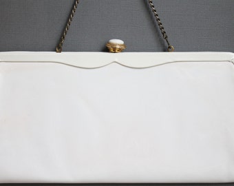 white patent leather clutch purse