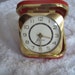 Vintage Sun Mark Travel Alarm Clock Wind up with Red Leather Brass Case