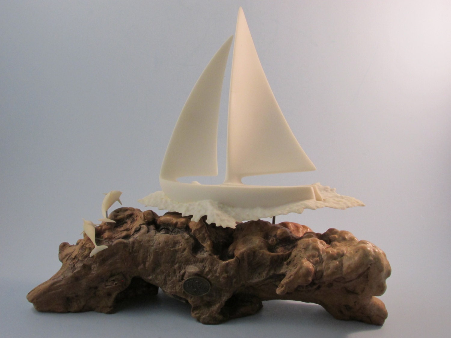 Vintage John Perry Sailboat and Dolphins Sculpture on Burl