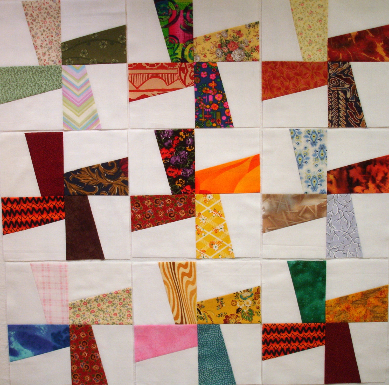 windmill-pieced-quilt-blocks-in-scrappy-colors