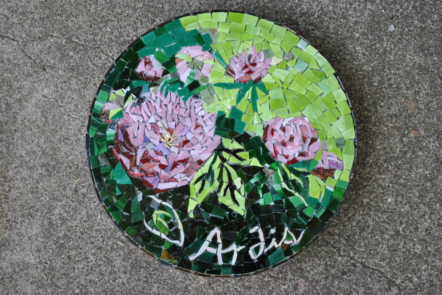 Custom designed mosaic stepping stone of the by midcenturymosaics