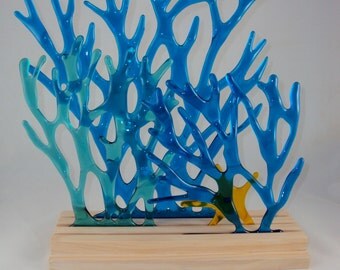 turquoise and blue transparent glass 'sea grass' with starfish
