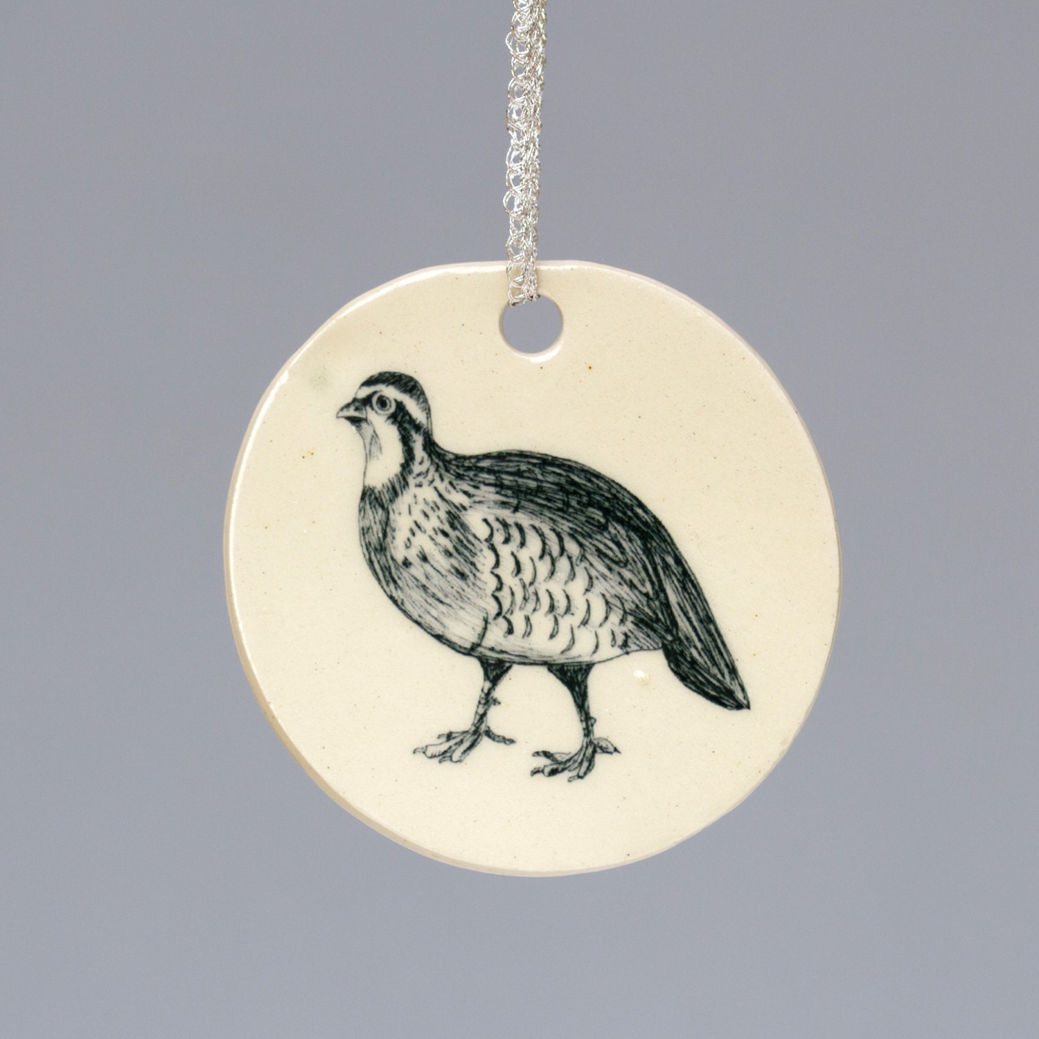 Ceramic handmade partridge / grouse Christmas decoration. Hand illustrated bird design. White, cream drawing hanger