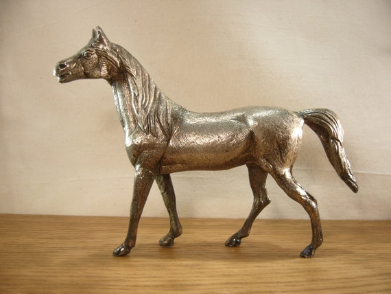 old metal horse figurines