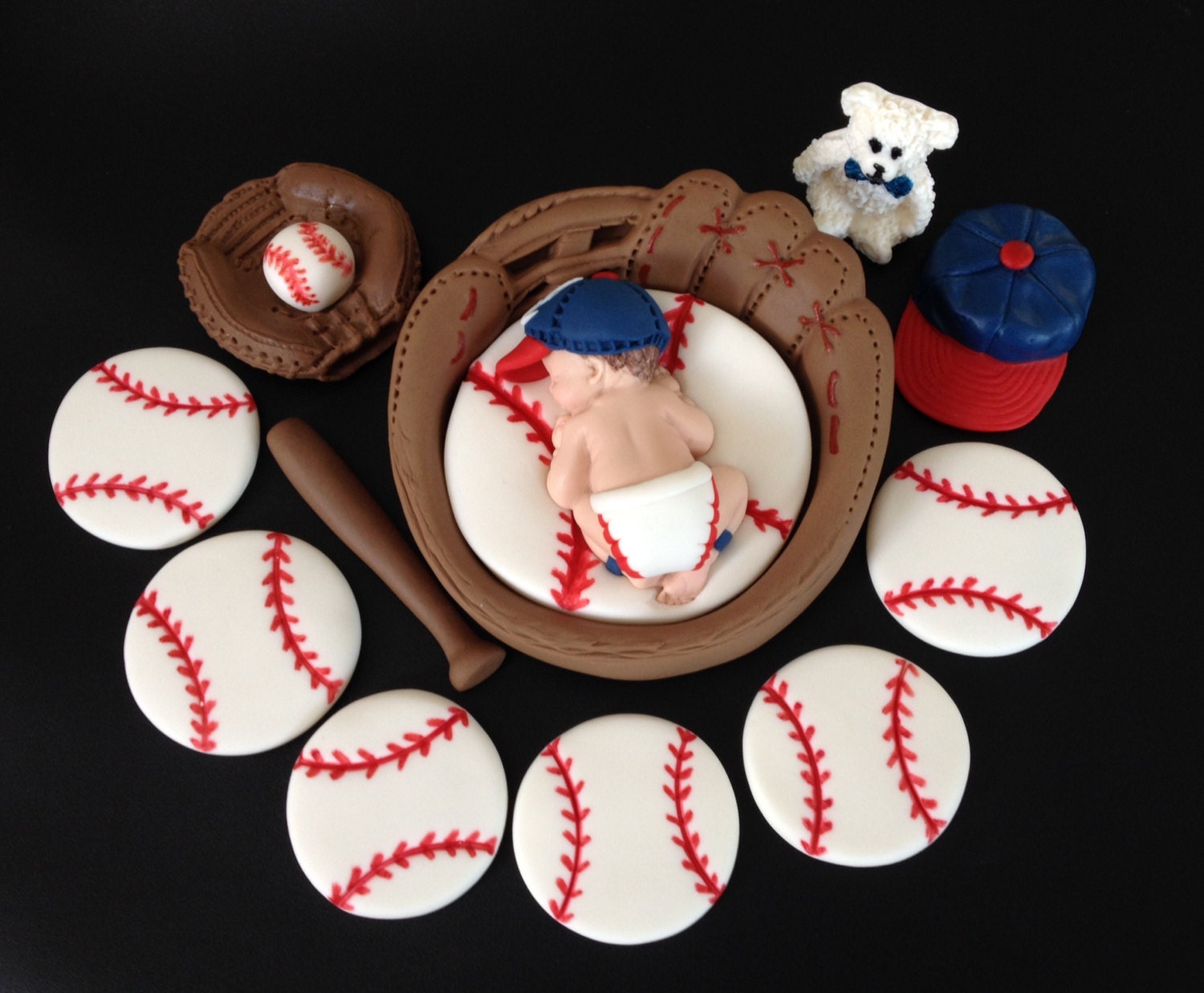 Fondant baby boy baseball inside a 3D glove cake topper in