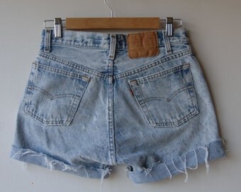 Items similar to High Waisted Distressed Levi's Shorts (Size 30) on Etsy