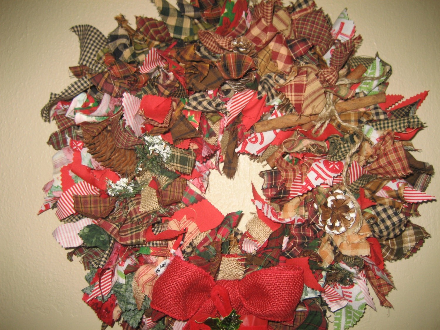 Primitive Christmas Wreath. So Full and Fluffy of Homespun and Christmas Fabric, Pine Cones, Cinnamon Sticks !! 20" Round.