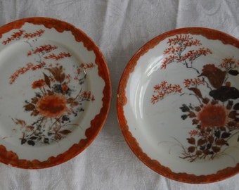 A pair of Japanese Hichozan Shinpo style porcelain plates