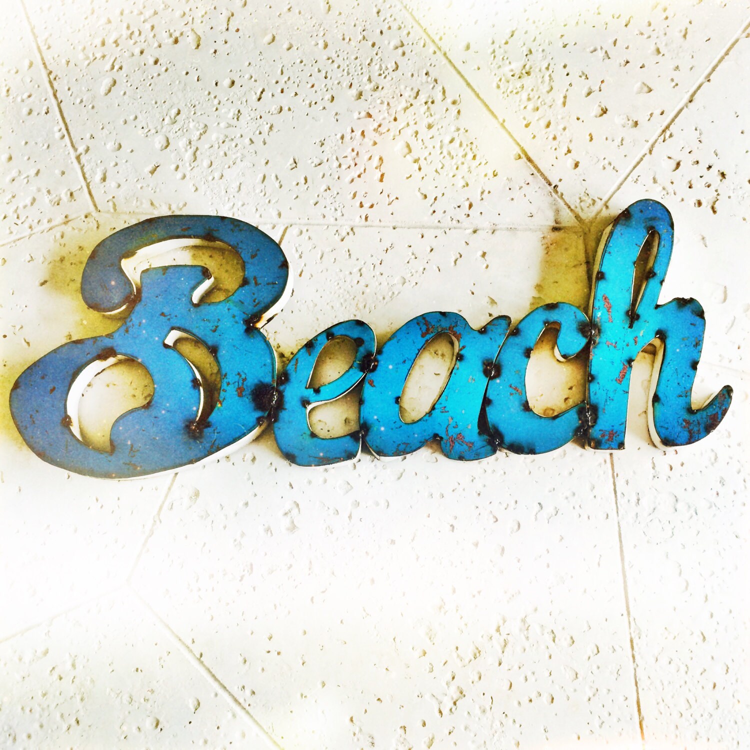 industrial aqua marine metal 'beach' sign
