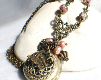 Butterfly pocket watch pendant, bronze butterfly with freshwater pearls charms and bronze accents.