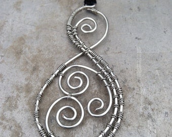 Traditional Maori Pikoura Pendant in Recycled Sterling Silver meaning the bond between us, connection, family